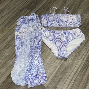 Brand new shein swim suit set . Two piece with sarong. Purple size 1X